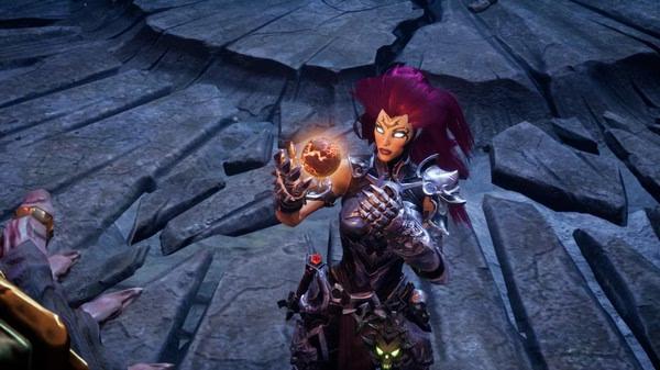 Darksiders III screenshot: Fury holding a fiery weapon, standing on a cracked stone floor in a dark, atmospheric setting.