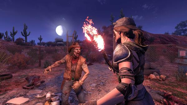 Screenshot from 7 Days to Die: A player character in armor holds a torch, facing a zombie in a desert landscape at night.