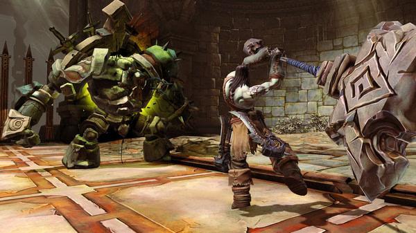 Darksiders II Deathinitive Edition screenshot: A warrior battles a large, armored golem in a stone-walled arena.