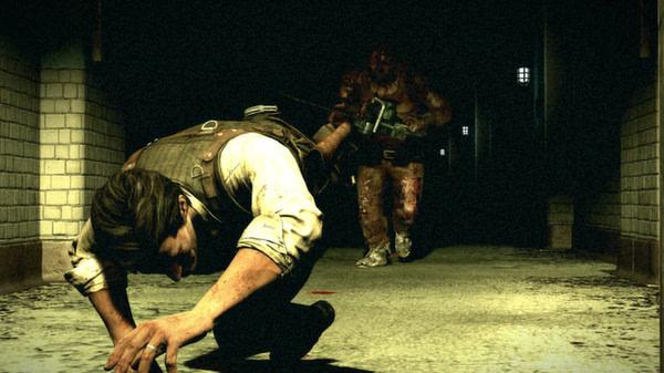Screenshot from The Evil Within: A character crawls through a dim hallway, pursued by a large, menacing figure wielding a weapon.