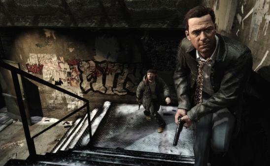 Screenshot from Max Payne 3 showing two characters on a graffiti-covered stairway, with one holding a gun and the other following.