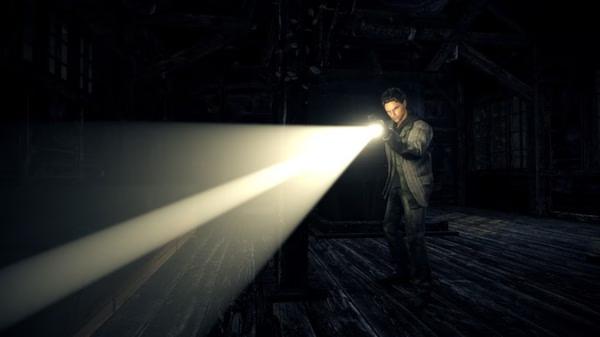 Alan Wake screenshot: A man holding a flashlight stands in a dark, abandoned building, illuminating his path with a focused beam of light.