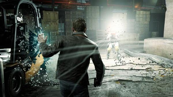 Quantum Break screenshot: A man in a leather jacket confronts an enemy in a warehouse, with time manipulation effects visible.