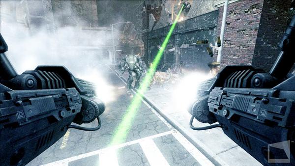 F.E.A.R. 2: Project Origin screenshot showing dual-wielded weapons firing at a mech in a smoky urban battlefield with green laser beams.