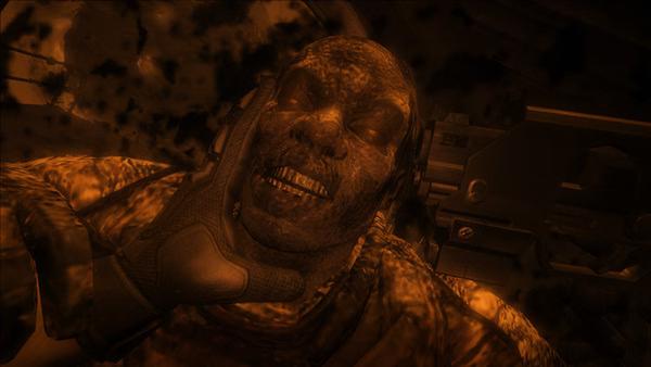 F.E.A.R. 2: Project Origin screenshot showing a close-up of a combat scene with a gloved hand grabbing an enemy soldier.