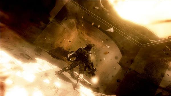 F.E.A.R. 2: Project Origin screenshot showing a soldier in tactical gear navigating a chaotic, debris-filled environment.
