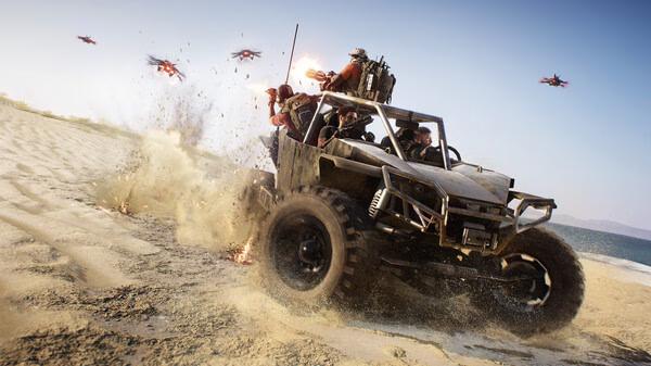 A dune buggy speeds across a sandy beach with drones overhead in this Tom Clancy's Ghost Recon Breakpoint screenshot.