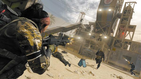 Call of Duty: Modern Warfare III screenshot: A soldier engages enemies near an industrial building in a desert setting.
