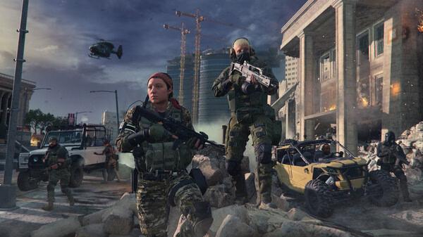 Call of Duty: Modern Warfare III screenshot showing armed soldiers in tactical gear amidst rubble, vehicles, and a helicopter in action.