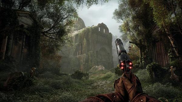 A Witchfire screenshot showing a player aiming a glowing weapon at an overgrown, ruined building in a lush forest setting.
