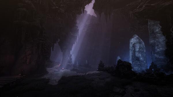 Screenshot from The First Berserker: Khazan showing a dimly lit cave with glowing crystals and a beam of light shining through.