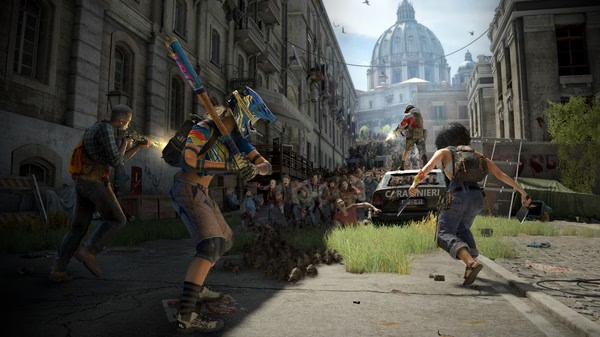 World War Z screenshot: Survivors armed with weapons face a horde of zombies in an urban street with a domed building in the background.
