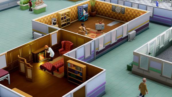 Screenshot of Two Point Hospital showing a staff member adjusting a fireplace in a cozy room, with another room containing a dartboard.