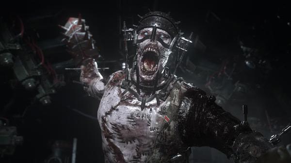 A screenshot from Call of Duty: WWII showing a grotesque zombie-like figure in tattered clothes and a metal headpiece lunging forward.