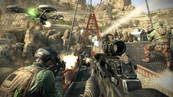 Call of Duty: Black Ops II screenshot showing soldiers in combat on a bridge with weapons drawn and a drone flying overhead.