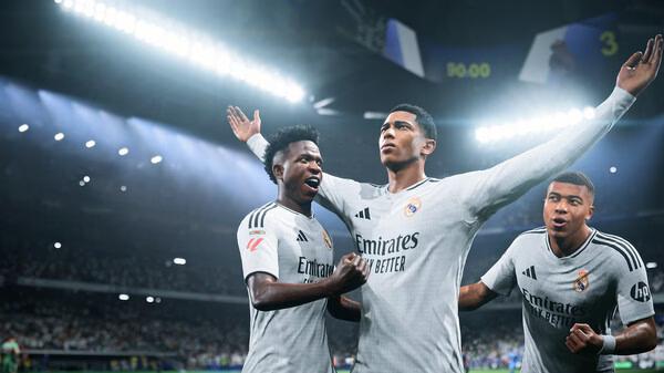 Screenshot from EA SPORTS FC 25 showing three soccer players in white jerseys celebrating a goal in a stadium.