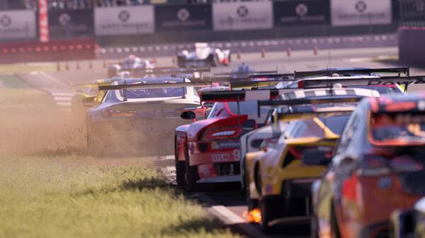 Forza Motorsport screenshot: A thrilling race with multiple cars speeding on a track, kicking up dust and grass.
