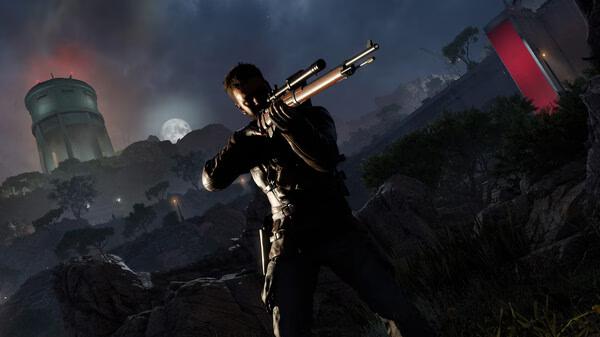 Screenshot from Sniper Elite: Resistance showing a sniper aiming his rifle in a rocky, moonlit landscape with a tower in the background.