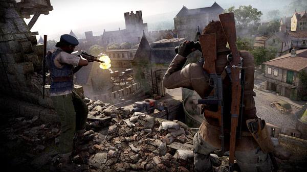 Sniper Elite: Resistance screenshot showing two soldiers aiming rifles from a rooftop, overlooking a detailed town landscape below.