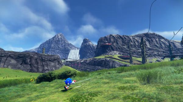 Sonic Frontiers screenshot: Sonic runs through a vast grassy field with mountains and a waterfall in the background.
