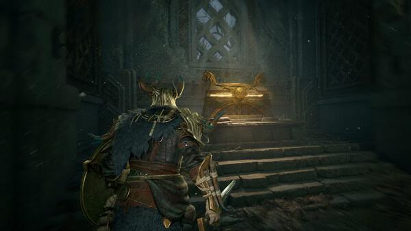 Mistfall Hunter screenshot: A warrior in armor approaches a glowing treasure chest inside a dimly lit, ancient stone chamber.
