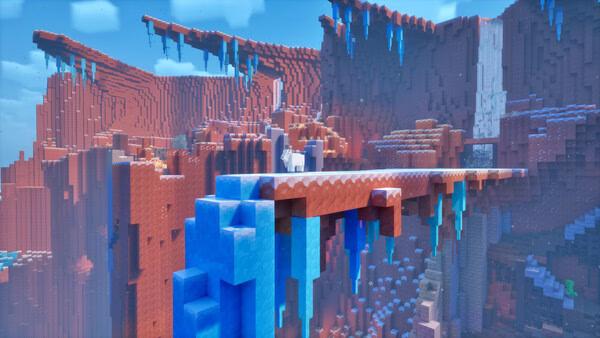 Screenshot from Minecraft Dungeons II showing a snowy, icy bridge in a red rocky canyon with icicles and a bright sky.