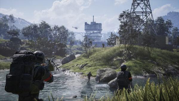 WARDOGS screenshot: Soldiers wade through a river toward a distant industrial structure, surrounded by lush greenery and rugged terrain.