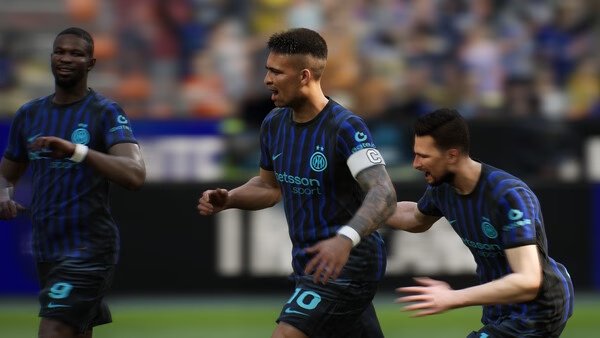 A screenshot from eFootball™ showing three players in blue and black jerseys celebrating during a match.