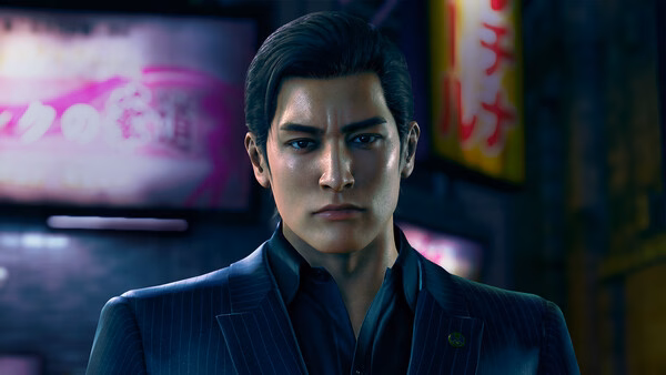 Screenshot from Yakuza Kiwami 3 & Dark Ties showing a man in a suit standing in a city street at night.