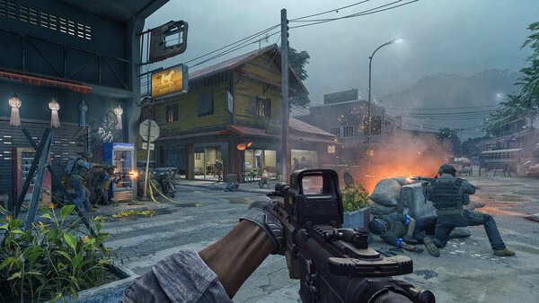 Gray Zone Warfare screenshot: A player aims an assault rifle in a street battle as teammates take cover near burning debris.