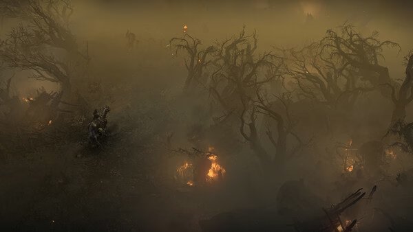 Diablo® IV screenshot: A lone rider travels through a foggy, eerie forest with twisted trees and glowing campfires.