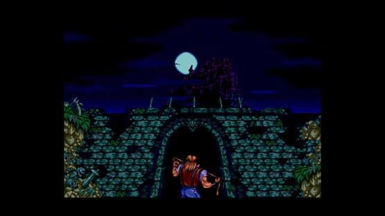 Screenshot from Castlevania Anniversary Collection showing a character facing a castle under a moonlit night sky.