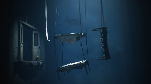 Little Nightmares II screenshot: A small figure in a yellow coat stands on a ledge, facing suspended platforms in a dimly lit room.