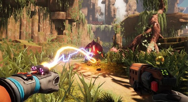 Screenshot from Journey To The Savage Planet shows a player using a gadget to attack a red alien creature in a lush, rocky landscape.