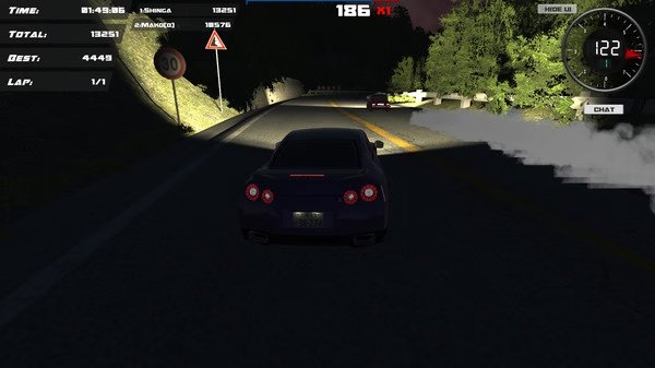 Drift86 screenshot: A car drifts around a curve on a dark forest road, headlights illuminating the path ahead.