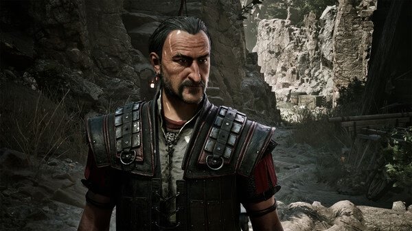 Gothic 1 Remake screenshot: A character stands in a rocky canyon, wearing detailed armor with straps and metal studs.