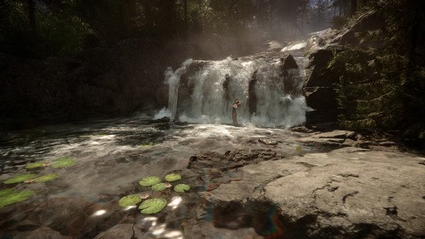 A screenshot from Sons Of The Forest showing a waterfall surrounded by lush forest, with a person standing in the water.