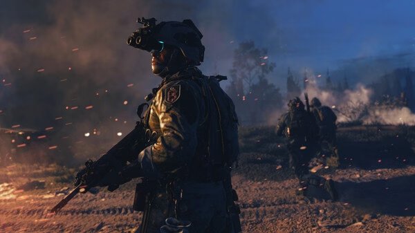 Call of Duty®: Modern Warfare® II screenshot showing soldiers in tactical gear amidst a smoky battlefield at dusk.
