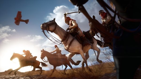 Screenshot from Battlefield™ 1 showing soldiers on horseback charging forward in a desert landscape, with a plane flying overhead.