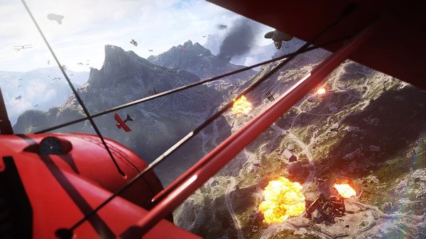 Aerial combat in a red biplane over mountainous terrain in a 'Battlefield™ 1' screenshot, with explosions and other planes visible.