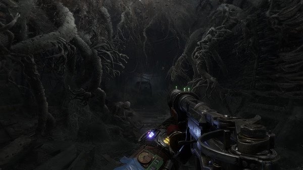 Metro Exodus screenshot: A player holds a weapon while exploring a dark, tangled underground tunnel with twisted roots.