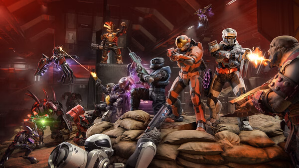 Halo Infinite screenshot: Spartans engage in intense combat against alien enemies in a vibrant red-lit battlefield.