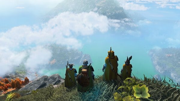 Screenshot from 'Light No Fire': Four adventurers in yellow cloaks overlook a vast, mountainous landscape with a turquoise lake below.