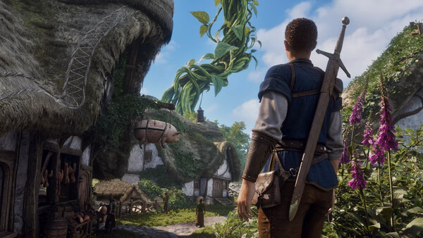 Fable screenshot: A character with a sword gazes at a giant beanstalk near quaint cottages under a blue sky.