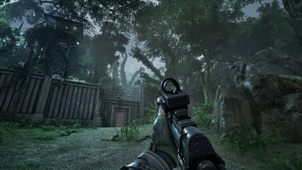 PUBG: Black Budget screenshot: A player aims their rifle at an enemy near a jungle outpost under a cloudy sky.