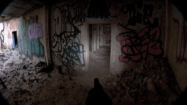 Screenshot from Unrecord showing a first-person view of a pistol aimed down a graffiti-covered, dilapidated hallway.