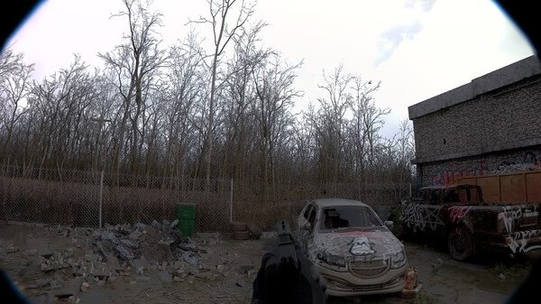 A screenshot from the game Unrecord showing a first-person view of a gun aimed at an abandoned car in a desolate outdoor area.