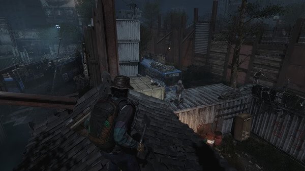 Screenshot from NAKWON: LAST PARADISE showing a character on a rooftop overlooking a fenced area with shipping containers at night.
