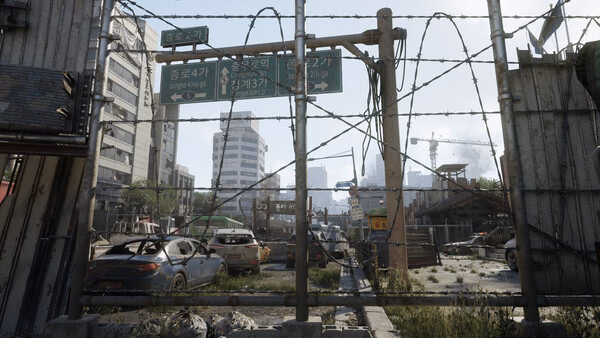 A screenshot from NAKWON: LAST PARADISE showing a post-apocalyptic cityscape with abandoned cars and barbed wire fences.