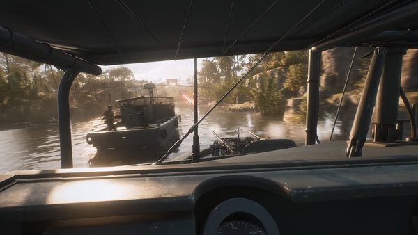 Screenshot of "Hell Let Loose: Vietnam" showing two military boats navigating a river, with distant gunfire visible.